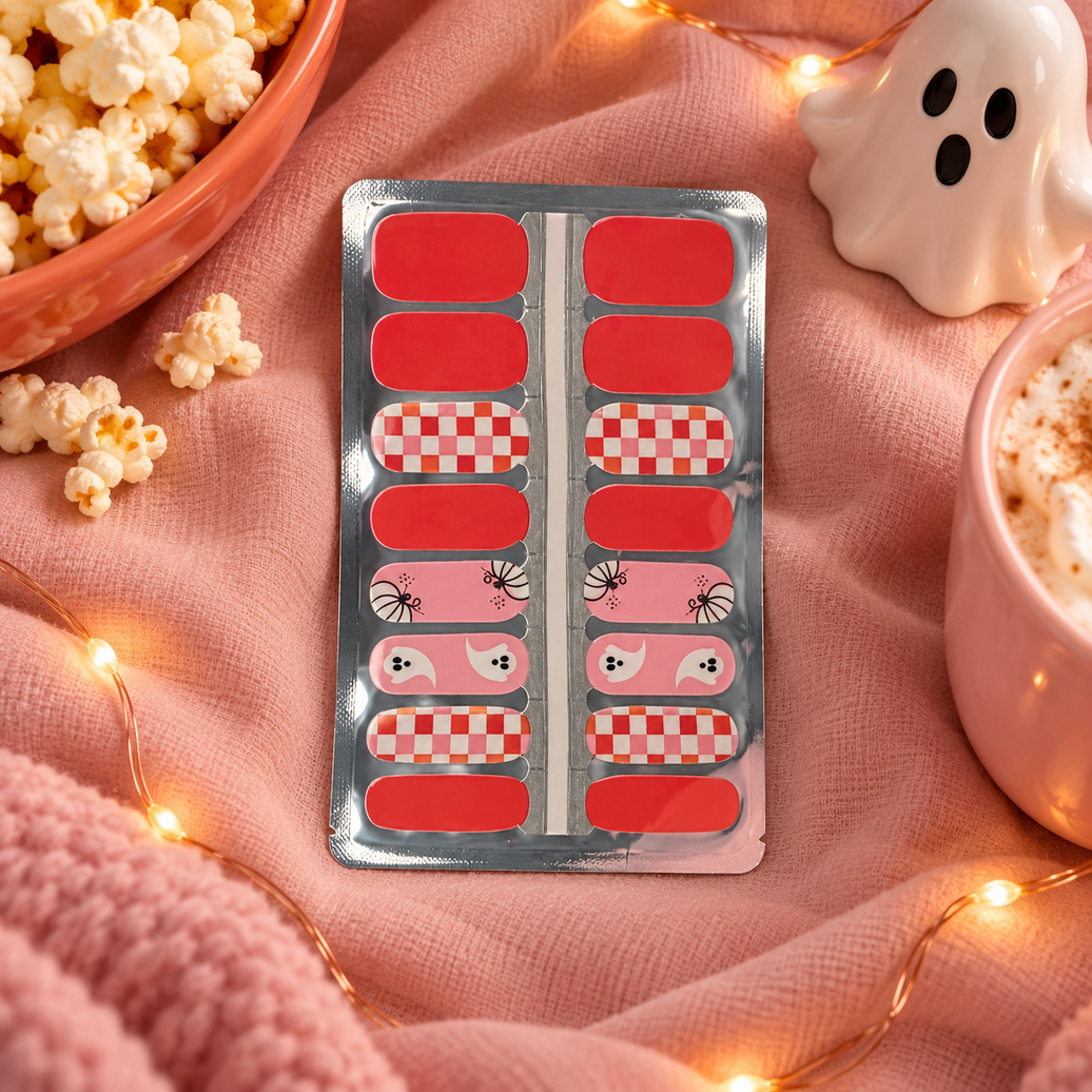 Cute orange and pink ghost Halloween nail wraps for movie night