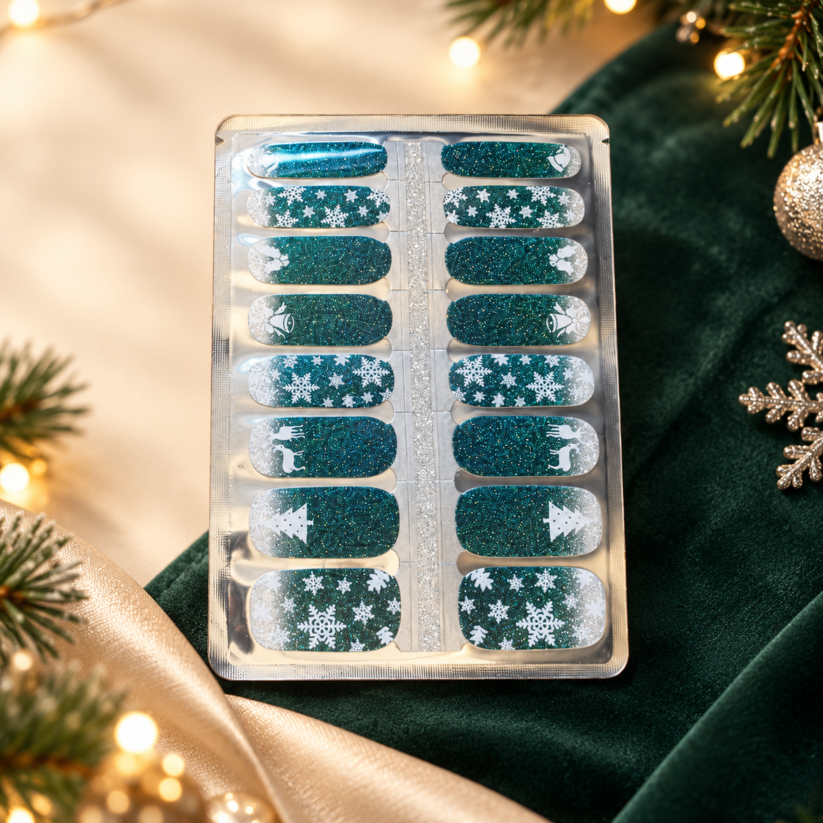 Twinkling Snowfall Christmas Nail Wraps, glittery teal with snowflakes, trees and reindeer – EZYNails nail wraps, NZ