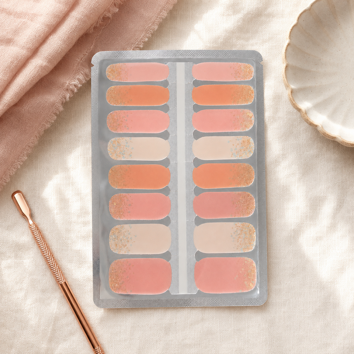 Apricot Glow peach, coral and nude nail wraps with gold glitter accents