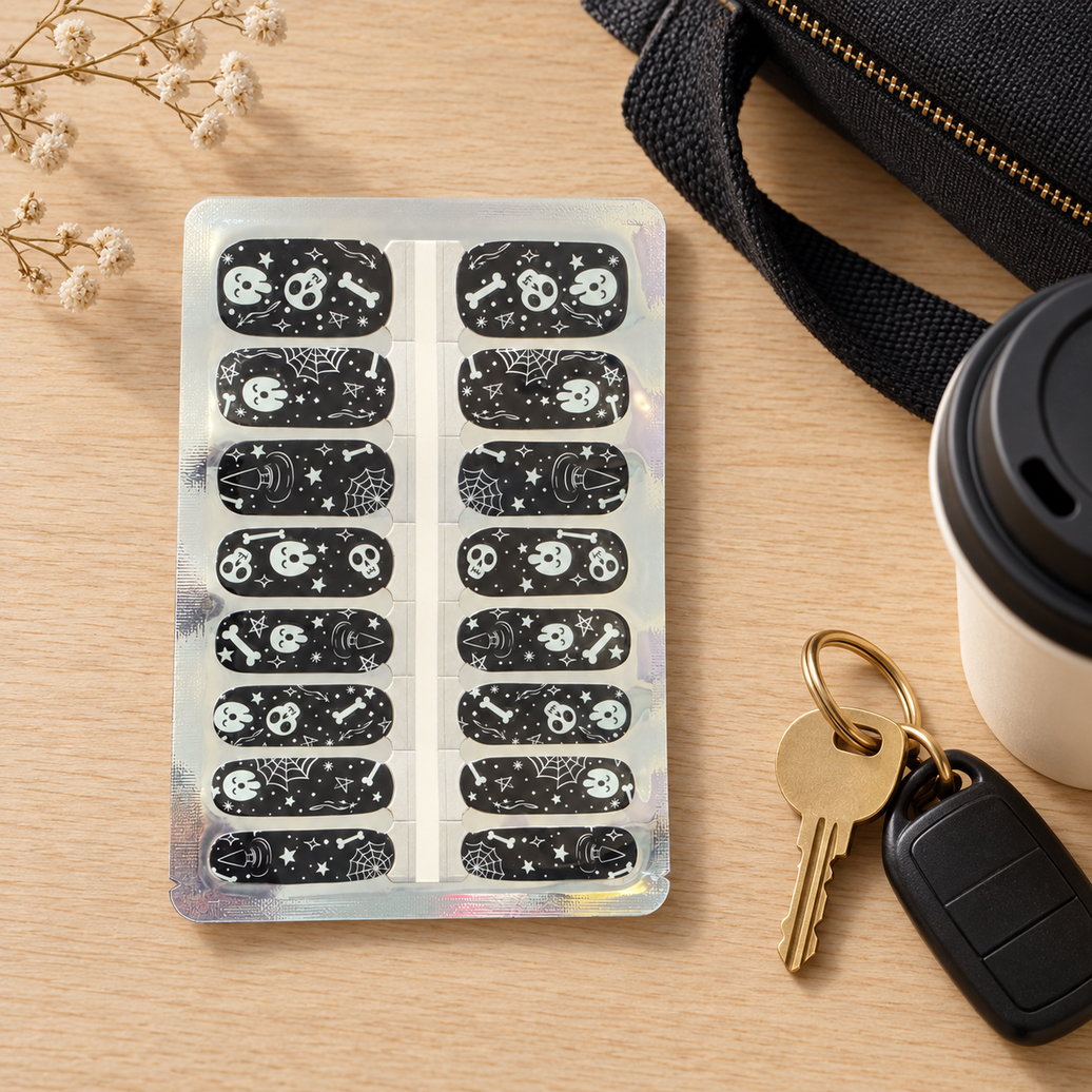 Black Skulls & Ghosts Halloween nail polish wraps with white skulls and ghosts on black – EzyNails NZ