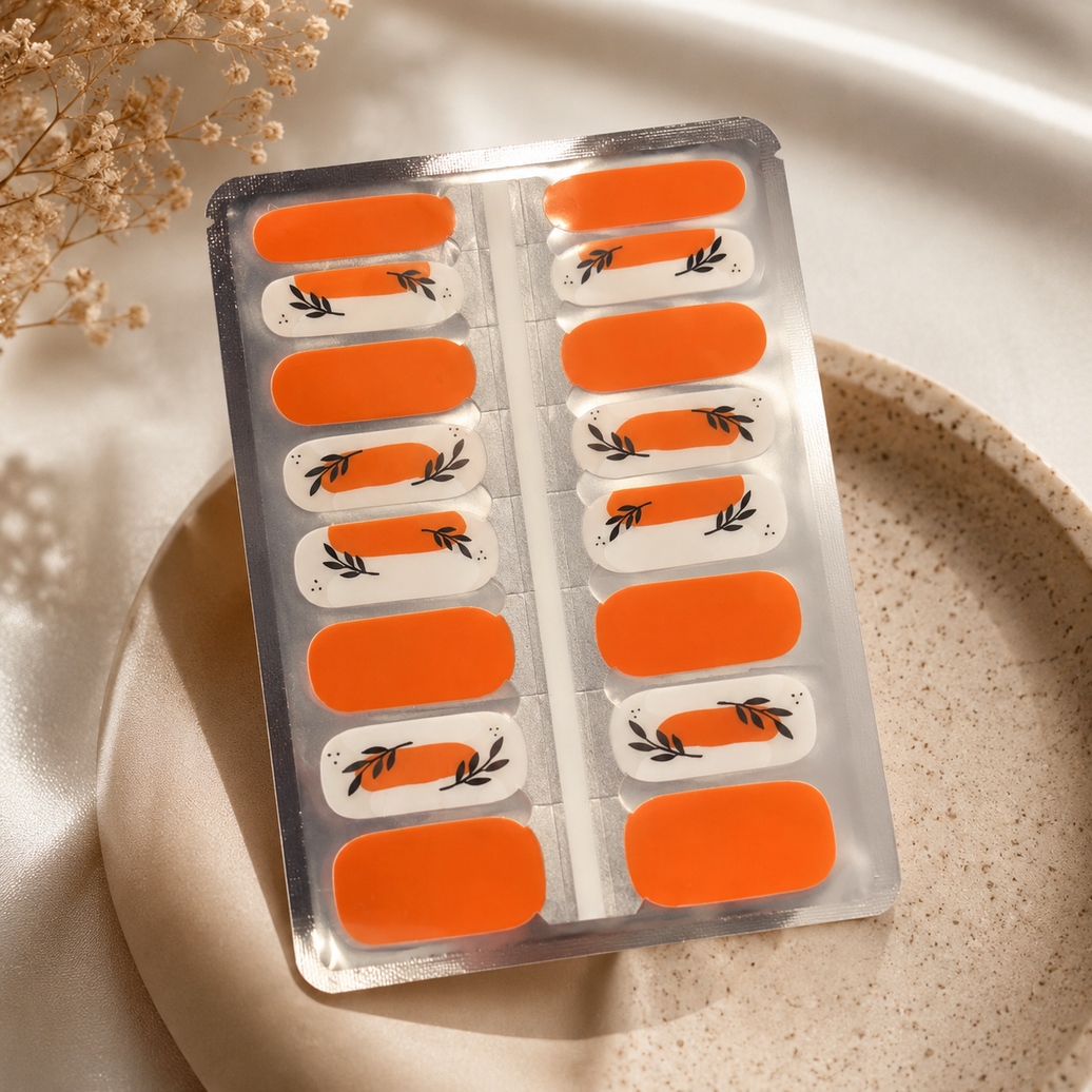 Citrus Grove bold orange nail wraps with leaf detailing